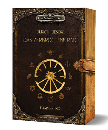 Das Cover zeigt mittig ein goldenes zerbrochenes Rad mit zwölf Speichen. Umrandet ist das Rad mit den Symbolen der zwölf Götter aus den Büchern. Im oberen und unteren Bereich befindet sich je eine Zierleiste, in der oberen ist der Reihentitel eingearbeitet. Autor und Titel stehen darunter, der Untertitel ist unter dem Rad. Rechts ist mittig ein Verschluss aufgemalt, der über den Buchschnitt verläuft, so dass es wirkt, als wäre das Buch verschlossen. Das Cover ist dunkel-, der Buchschnitt hellbraun.